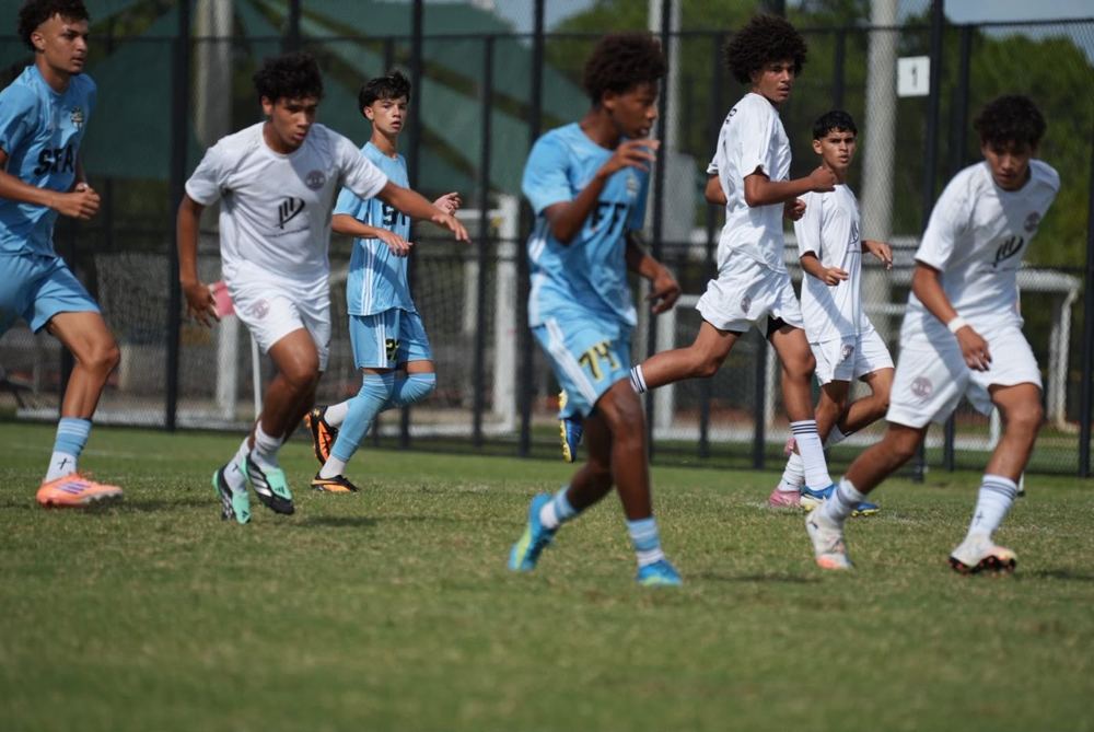 Chaz L. Grey on the ball in midfield traffic